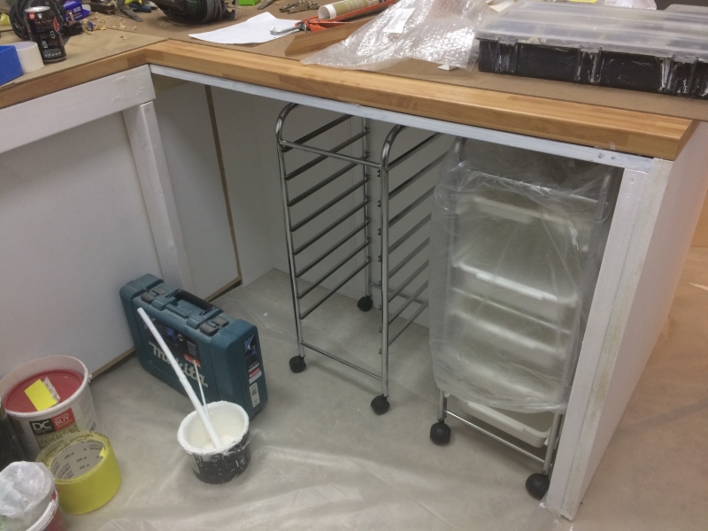 Yes - they are hairdressers' trolleys! They will hold the many tools and moulds used for cake decoration, and can easily be wheeled into the front of the shop when classes are in progress.